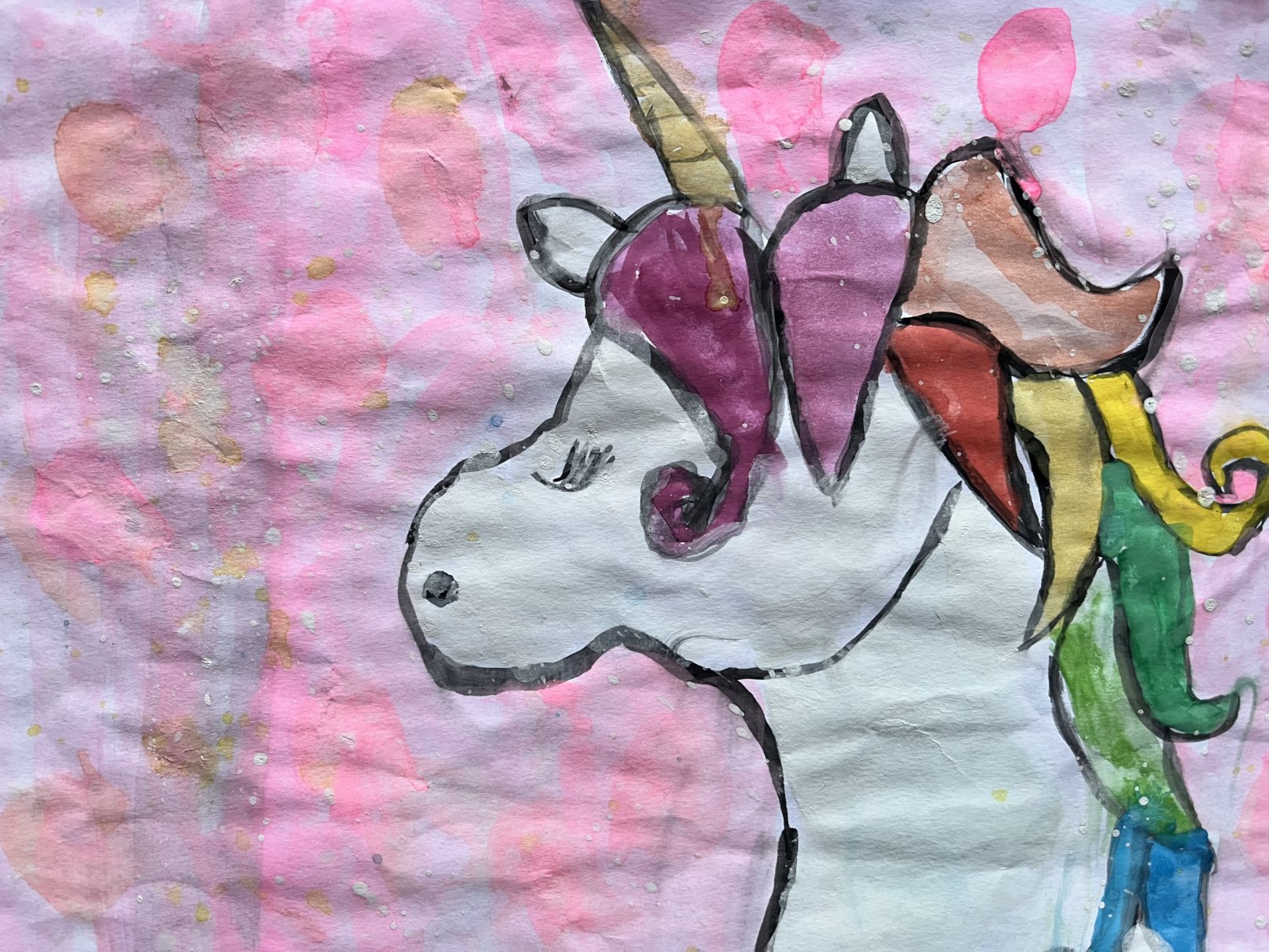 Happy unicorn with rainbow hair